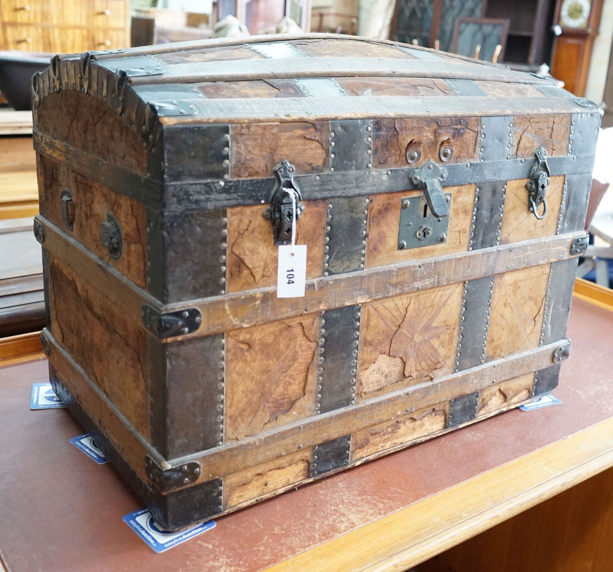 A late Victorian iron bound domed top trunk, length 82cm, depth 48cm, height 60cm